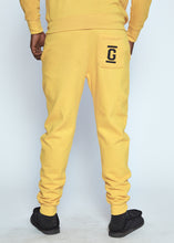 Load image into Gallery viewer, Yellow Sweat Pants Black Logo
